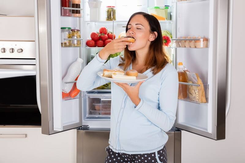 Mengidam makanan saat hamil adalah hal yang umum terjadi pada kehamilan. Sumber foto: Getty Images